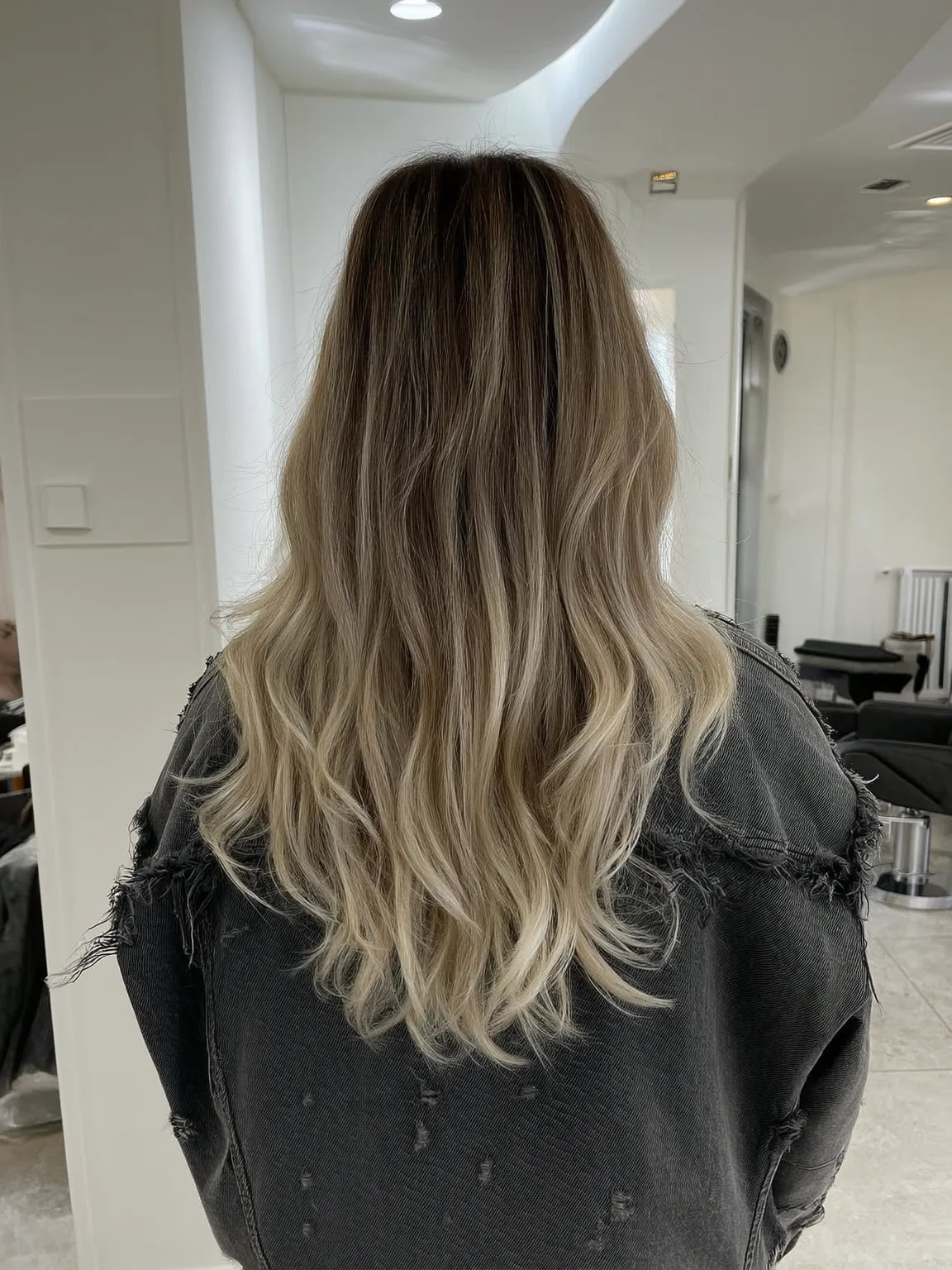 Long Layers with Honey Blonde Balayage Waves